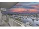 Scenic view of marina from condo balcony on a partially cloudy evening at HarbourGate Resort and Marina at 2100 Sea Mountain Hwy. # 202, North Myrtle Beach, SC 29582