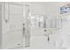 Bathroom featuring large tub, glass shower, and neutral tile at 2241 Waterview Dr. # 532, North Myrtle Beach, SC 29582