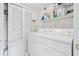 Functional laundry room with a washer, dryer, and plenty of storage space at 2241 Waterview Dr. # 532, North Myrtle Beach, SC 29582