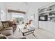 Bright living room with neutral tones, a vaulted ceiling, and a built-in entertainment center at 2241 Waterview Dr. # 532, North Myrtle Beach, SC 29582