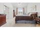 Comfortable primary bedroom showcasing carpet floors, wood furniture, and a cozy atmosphere at 2241 Waterview Dr. # 532, North Myrtle Beach, SC 29582