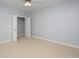 Neutral bedroom with standard closet and carpet flooring; great natural light from open doors at 249 Ashepoo Creek Dr., Myrtle Beach, SC 29579
