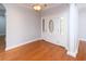 Inviting foyer featuring hardwood floors and a decorative front door at 249 Ashepoo Creek Dr., Myrtle Beach, SC 29579