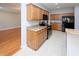 Spacious kitchen boasts stainless steel appliances, granite countertops and wood cabinets at 249 Ashepoo Creek Dr., Myrtle Beach, SC 29579