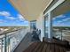 Relaxing balcony with seating, offering views of the cityscape under a bright sky at 2801 S Ocean Blvd. # 1041, North Myrtle Beach, SC 29582