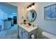 Bathroom showcases a modern vanity with an open view of the kitchen area at 2801 S Ocean Blvd. # 1041, North Myrtle Beach, SC 29582