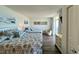 Spacious bedroom with two beds, a seating area, and access to a private balcony at 2801 S Ocean Blvd. # 1041, North Myrtle Beach, SC 29582