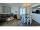 Cozy living area features modern furnishings, a dining table, and an open layout at 2801 S Ocean Blvd. # 1041, North Myrtle Beach, SC 29582