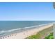 Scenic beach and ocean view from an elevated position, capturing the serene coastal atmosphere at 2801 S Ocean Blvd. # 1634, North Myrtle Beach, SC 29582
