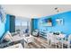 Vibrant living room with beach-themed decor, cozy seating, and an ocean view balcony at 2801 S Ocean Blvd. # 1634, North Myrtle Beach, SC 29582