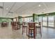 Inviting restaurant with tables, chairs, a view of the ocean, and access to the pool at 2801 S Ocean Blvd. # 1634, North Myrtle Beach, SC 29582
