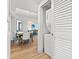 Hallway view with in-unit laundry, dining area, and living room at 3000 N Ocean Blvd. N # 1401, Myrtle Beach, SC 29577