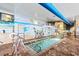 Indoor pool area with beach mural adds fun and whimsy to this space at 3000 N Ocean Blvd. N # 1401, Myrtle Beach, SC 29577