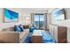 Relax in this contemporary living room with a plush sofa and ocean views at 3000 N Ocean Blvd. N # 1401, Myrtle Beach, SC 29577