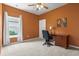 Cozy bedroom with a large window, work desk, and neutral carpeting at 3021 Sistine St., Myrtle Beach, SC 29579