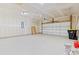 Spacious two car garage with painted walls, high ceilings and door openers at 3021 Sistine St., Myrtle Beach, SC 29579