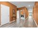 Inviting hallway with wood floors and open doorways to living spaces at 3021 Sistine St., Myrtle Beach, SC 29579
