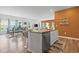 Modern kitchen island featuring a stainless dishwasher, granite countertops, and seating at 3021 Sistine St., Myrtle Beach, SC 29579
