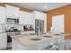 Kitchen island featuring granite countertops, stylish barstools, and pendant lighting at 3021 Sistine St., Myrtle Beach, SC 29579