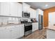 Modern kitchen featuring stainless steel appliances, white cabinets and granite countertops at 3021 Sistine St., Myrtle Beach, SC 29579