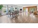Spacious living room and dining area with abundant natural light and wood-look flooring at 3021 Sistine St., Myrtle Beach, SC 29579