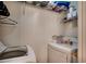Laundry room with white washer and dryer, wire shelving, and storage containers at 3120 Mercer Dr., Conway, SC 29526
