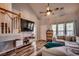 Inviting living room featuring a staircase, vaulted ceilings, wood flooring, comfortable sectional, and a media center at 3120 Mercer Dr., Conway, SC 29526