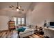 Cozy living room with vaulted ceilings, wood flooring, comfortable sectional sofa, and sun-lit windows at 3120 Mercer Dr., Conway, SC 29526