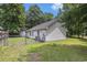 View of the backyard and fencing with a shed at 3429 Mishoe St., Loris, SC 29569