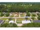 An aerial shot showcases the house at 3808 Mayfield Drive among lush green trees at 3808 Mayfield Dr., Conway, SC 29526