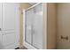 Bathroom with sliding glass door shower, and white door at 3808 Mayfield Dr., Conway, SC 29526