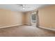 Bedroom with ceiling fan, window, and wall trim at 3808 Mayfield Dr., Conway, SC 29526