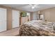 Cozy bedroom with a view of the en-suite bathroom and access to multiple closets at 3808 Mayfield Dr., Conway, SC 29526