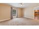 Bedroom with ceiling fan, window, and view to the kitchen at 3808 Mayfield Dr., Conway, SC 29526