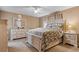 Calm main bedroom with a ceiling fan, a decorative headboard, and matching nightstands at 3808 Mayfield Dr., Conway, SC 29526