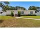 Attractive single-story home featuring a manicured lawn and inviting walkway at 3808 Mayfield Dr., Conway, SC 29526