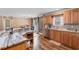 Open kitchen design featuring wood cabinets, stainless steel appliances, and a breakfast bar at 3808 Mayfield Dr., Conway, SC 29526