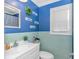 Bright bathroom with wainscoting and calming decor at 3827 El Duce Pl., Myrtle Beach, SC 29588