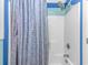 This bathroom features a bright shower stall with a shower curtain at 3827 El Duce Pl., Myrtle Beach, SC 29588