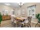 Bright dining room featuring a window, decorative sign, and stylish chairs at 388 Hillsborough Dr., Conway, SC 29526