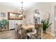 Elegant dining room with decorative mirror, stylish lighting, and comfortable seating at 388 Hillsborough Dr., Conway, SC 29526