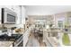 Bright kitchen area featuring modern appliances and granite countertops and open eat-in area at 388 Hillsborough Dr., Conway, SC 29526