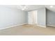 Comfortable bedroom offering ceiling fan, neutral carpet, and access to a closet at 390 Boundary Ave., Murrells Inlet, SC 29576