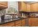 Kitchen details featuring stainless steel appliances, dark countertops, and modern fixtures at 390 Boundary Ave., Murrells Inlet, SC 29576