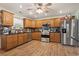 Updated kitchen features stainless appliances, stylish backsplash, and ample counter space at 390 Boundary Ave., Murrells Inlet, SC 29576