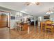 Open-concept kitchen and living area offers great sight lines, hardwood floors and breakfast bar at 390 Boundary Ave., Murrells Inlet, SC 29576