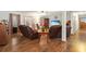 Comfortable living room features hardwood floors, ceiling fan, and leather seating at 390 Boundary Ave., Murrells Inlet, SC 29576