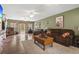 Bright living room featuring hardwood floors and backyard access at 390 Boundary Ave., Murrells Inlet, SC 29576