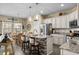 Kitchen island features granite counters, seating, and pendant lights at 413 Wine Ct., Conway, SC 29527
