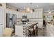 Kitchen island with granite counters, brick accents and pendant lights at 413 Wine Ct., Conway, SC 29527